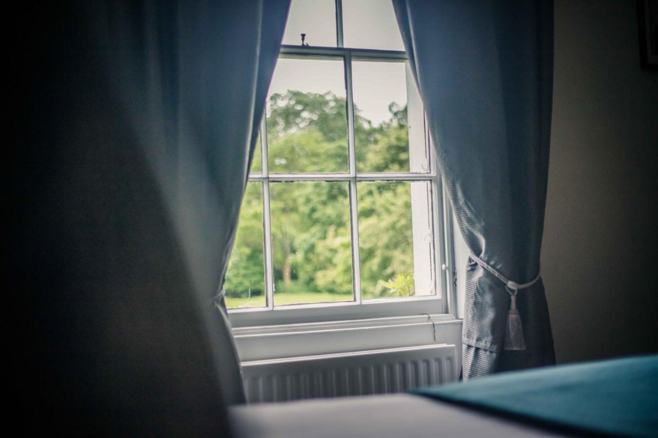 Caistor Hall Arminghall Buitenkant foto